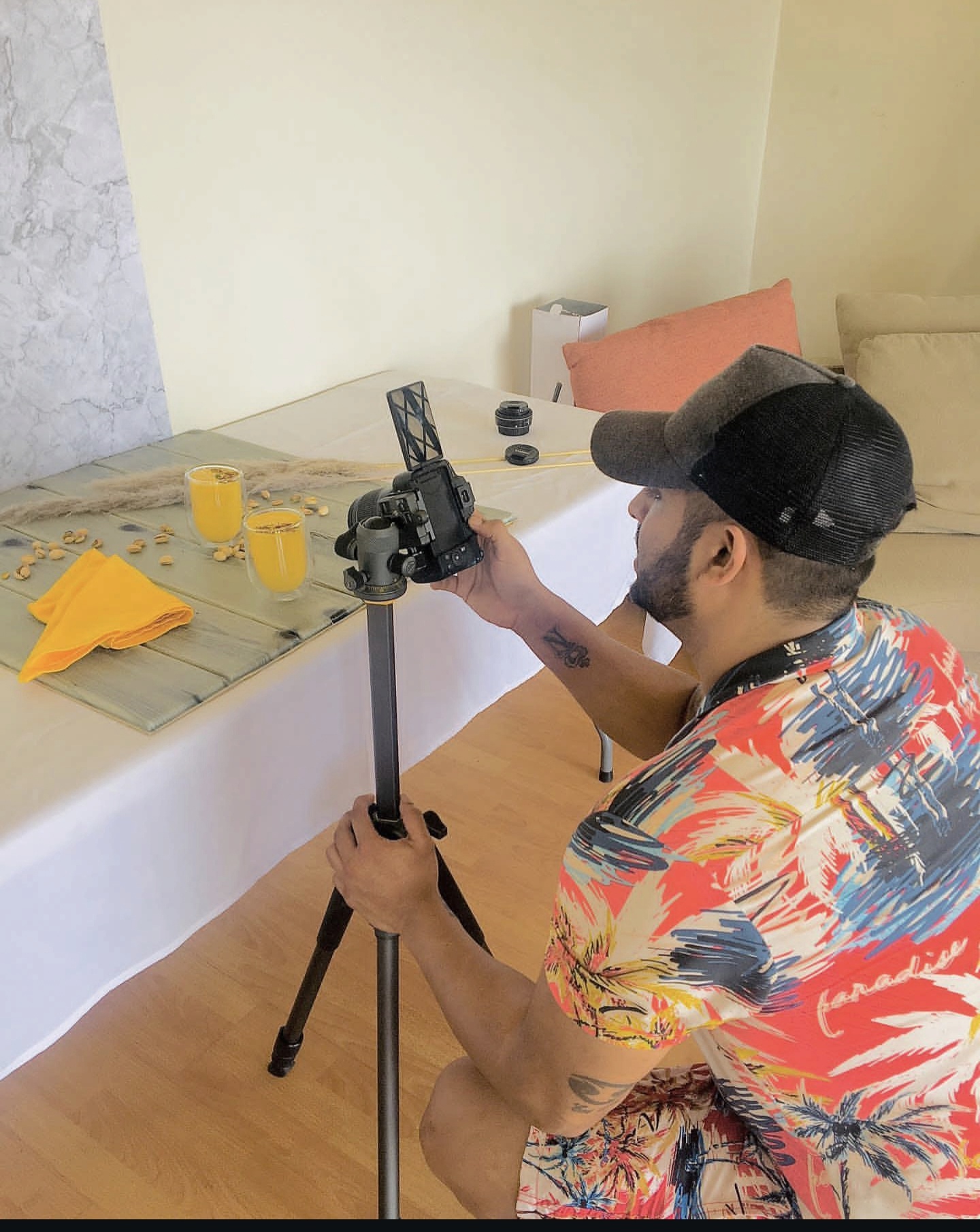 Behind the lens — a makeshift home studio, one shaft of light at a time.