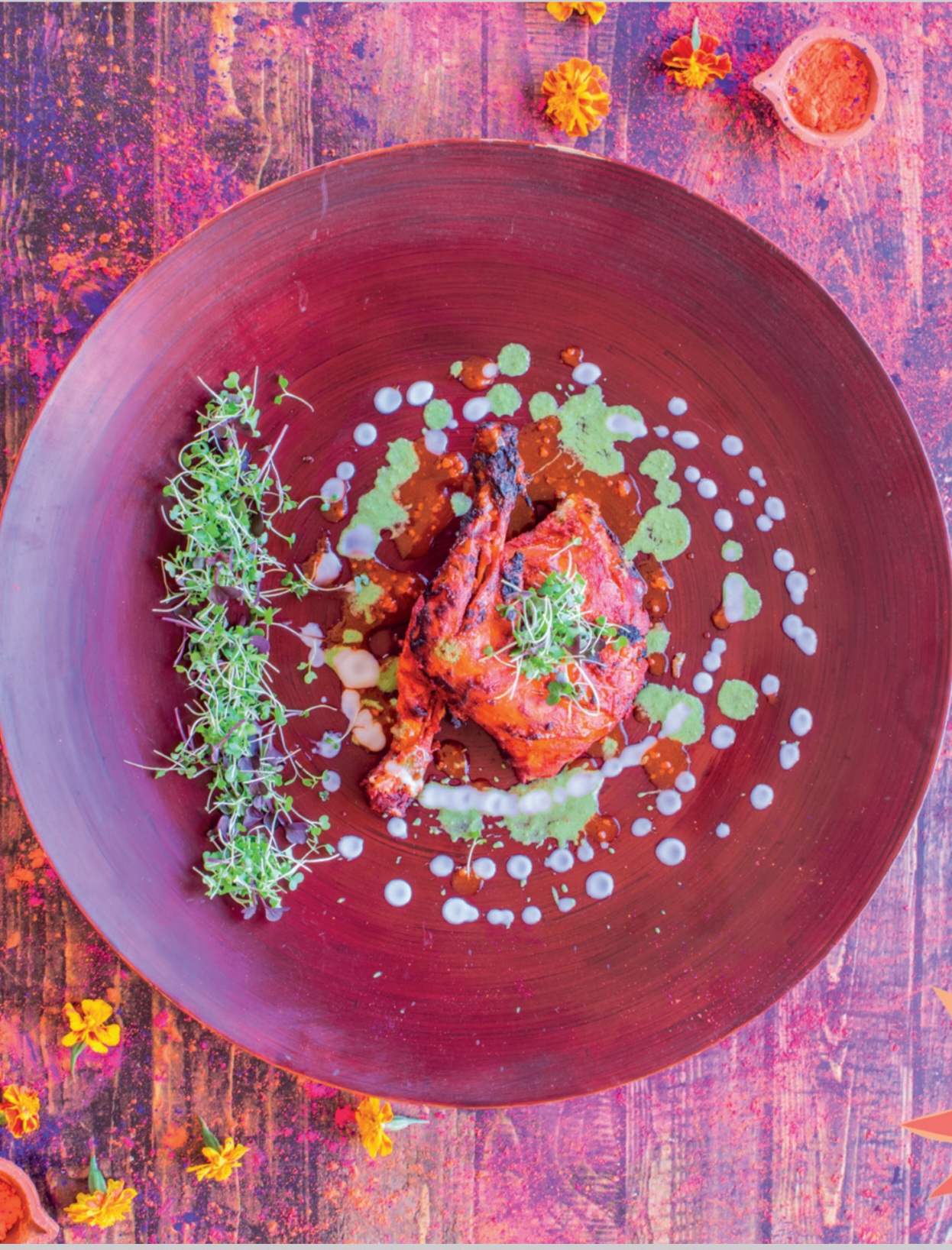 Tandoori chicken on a clay plate